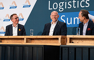 The Summit speakers at the counter